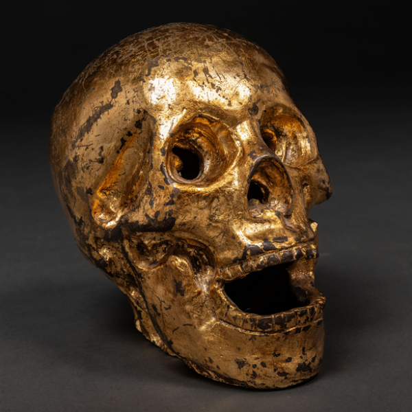 "Cráneo" Escultura realizada en bronce dorado del siglo XX