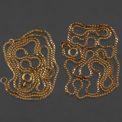 Conjunto de dos cadenas en oro amarillo de 18 kt.