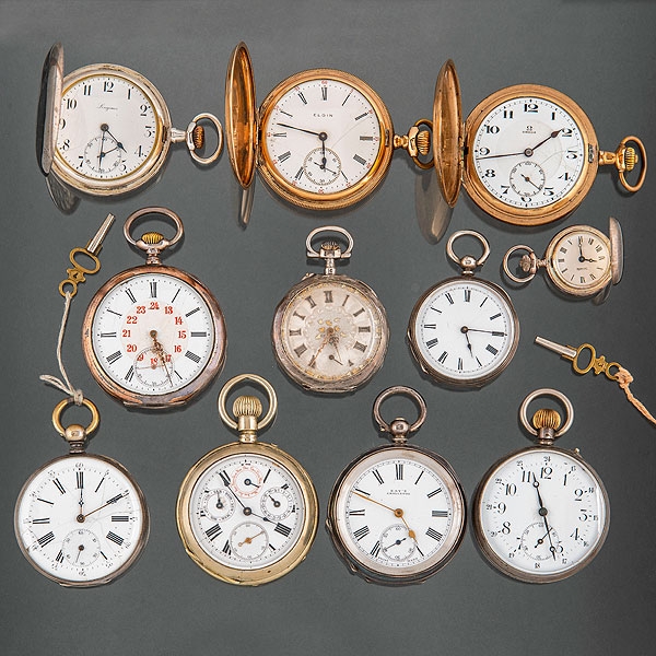 Conjunto de 9 relojes de bolsillo en plata punzonada 