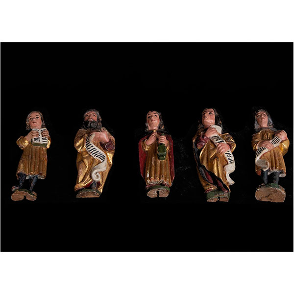 Conjunto colonial Mexicano formado por 5 Apóstioles, en madera tropical tallada y dorada, siglo XVII, Nueva España. 