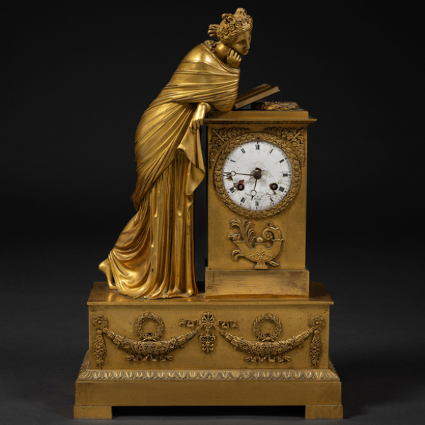"Alegoría del estudio" Reloj de sobremesa francés época Imperio en bronce dorado. h. 1830-40
