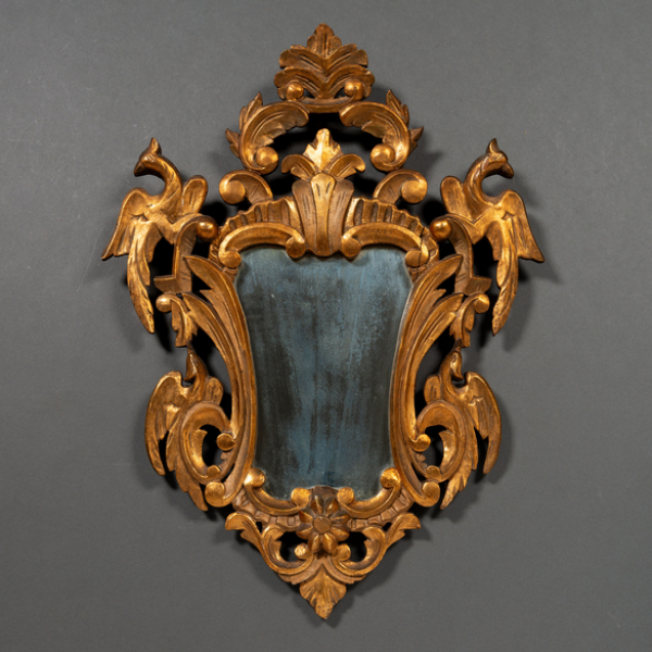 Espejo en madera tallada y dorada del siglo XIX