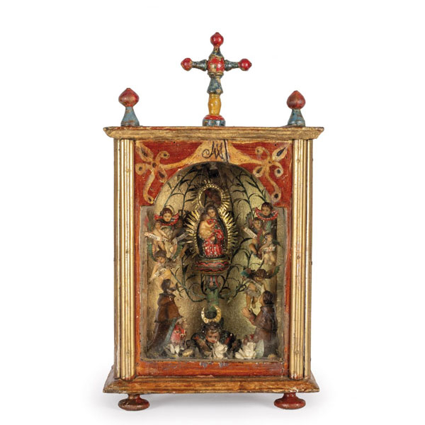 Escaparate realizado en cera modelada, policromada y dorada con Imaculada Concepción.
