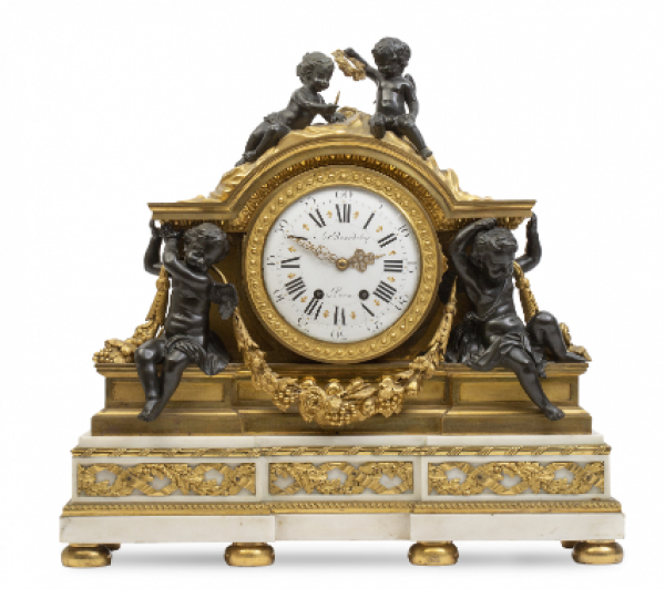 "A. Beurdeley á Paris".  Reloj de sobremesa de estilo Luis XVI de mármol blanco, bronce dorado y bronce pavonado.  París, h. 1880. 