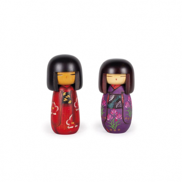 Pareja de muñecas japonesas Kokeshi S. XX.   Realizadas en madera tallada y policromada.