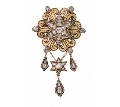 Broche de ffss S. XIX en forma de flor con estrella central de diamantes de talla rosa