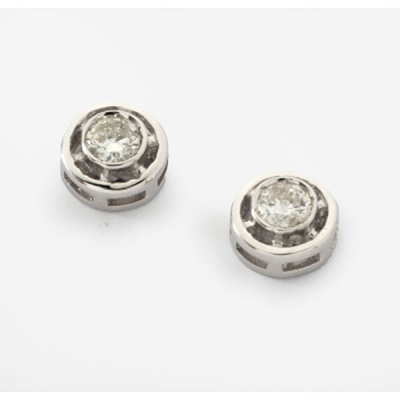 Pendientes chatón en oro blanco con 2 diamantes talla brillante  con un peso total de 0,32 cts. aprox.