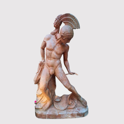 En el estilo de Innocenzo Fraccaroli (Verona, 1805 - Milan, 1882) "Aquiles". Per&iacute;odo fascista, primera mitad del siglo XX.   Travertino rojo tallado