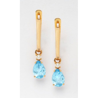 Pendientes en oro rosa con topacios azules en foma de lágrima y diamantes talla brillante.