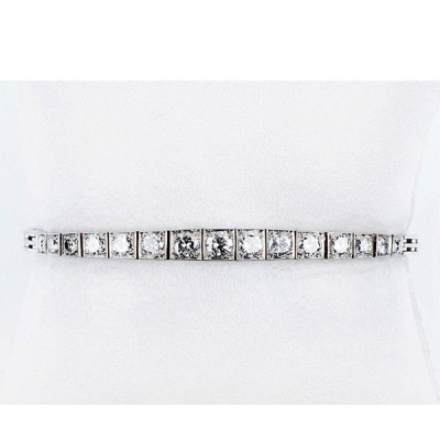 Pulsera semi-riviere en platino u oro blanco, con diamantes, talla brillante