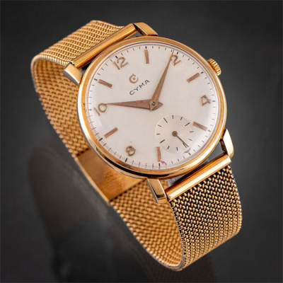 CYMA, Reloj de caballero con mecanismo a cuerda en oro amarillo de 18 kt.