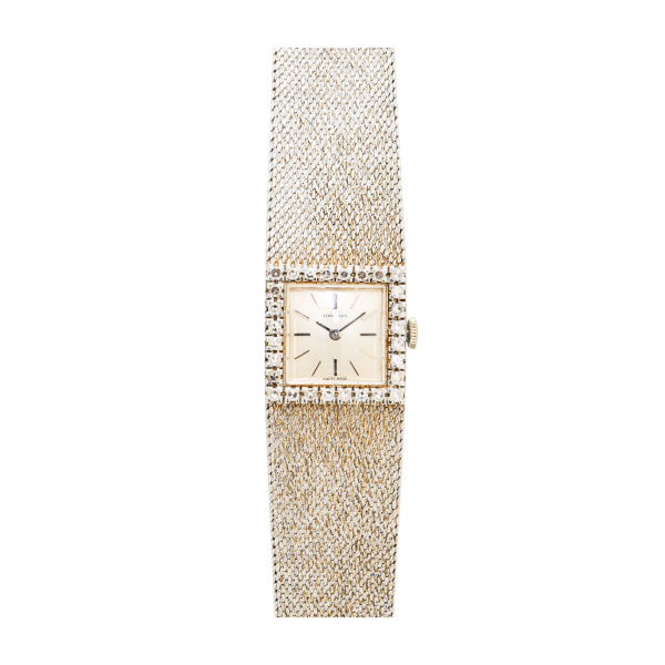 Reloj Longines de pulsera para señora. En oro blanco y bisel con diamantes talla brillante.
