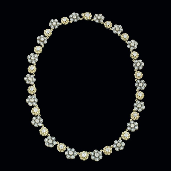 Collar de oro 14 K y plata flores con diamantes. 