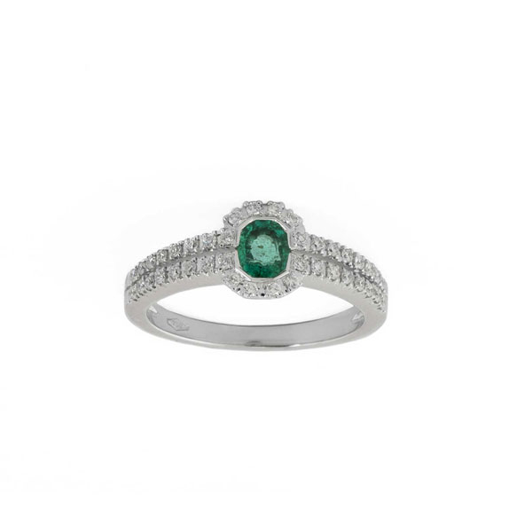 Anillo en oro blanco 18 K con una bonita esmeralda semi-oval