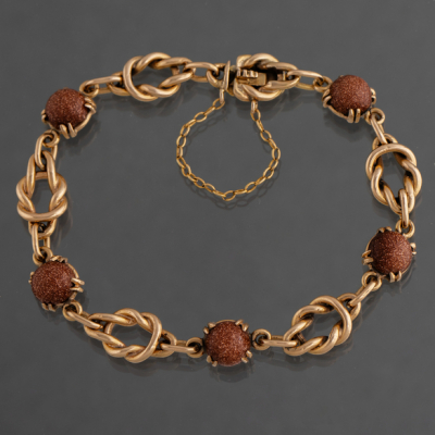 Pulsera de eslabones en oro amarillo de 18 kt con piedras de venturina.