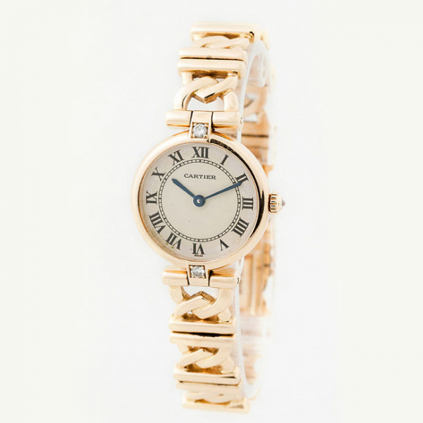 Reloj sra., suizo, CARTIER Vendôme, ref. 1068 decorada con un limpio y blanco diamante y oro amarillo 18 K.