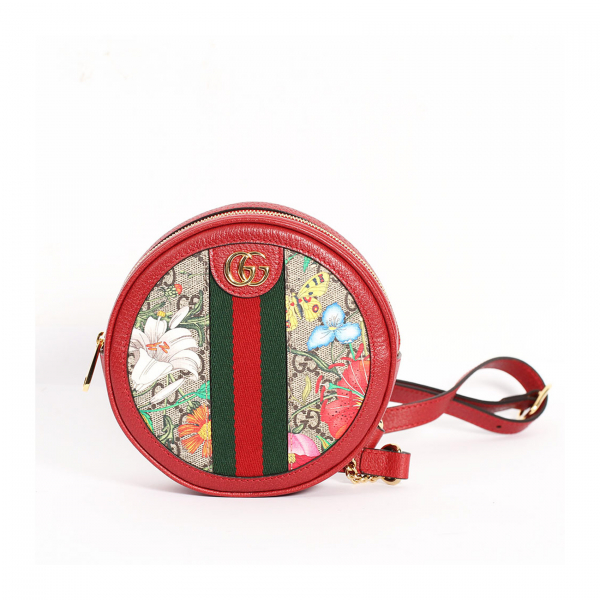 GUCCI. Pequeña mochila circular de la colección «Flora Ophidia» en lona con estampado floral y anagrama de la firma  