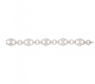 Brazalete Art-Decó de brillantes de talla antigua, con diseño de cinco piezas lobuladas articuladas con aros.   En oro blanco de 18 K.