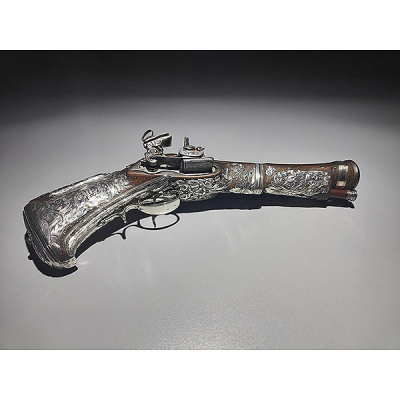 Pistola Trabuco de cinturón Miquelet - Lock ornada en plata mexicana, Nueva España, siglo XVIII.