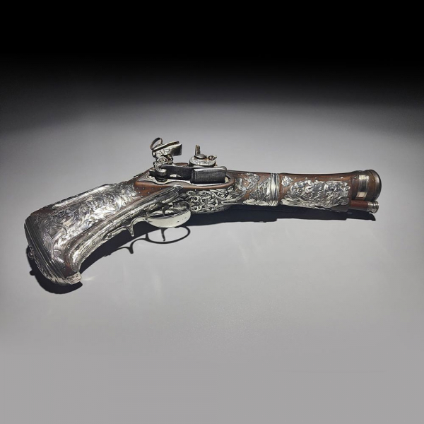 Pistola Trabuco de cinturón Miquelet - Lock ornada en plata mexicana, Nueva España, siglo XVIII.
