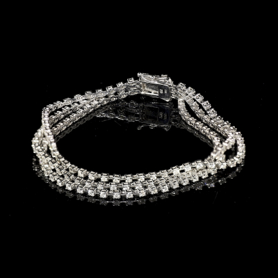 Pulsera "rivi&eacute;re" en oro blanco de 18 k y diamantes. 