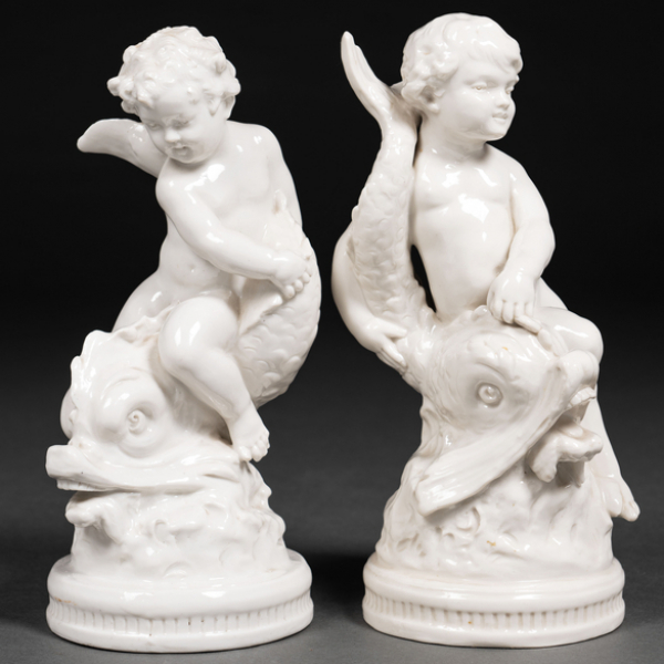 "Niños montados en delfín" Conjunto de dos figuras esmaltadas en capo Di Monti siglo XX