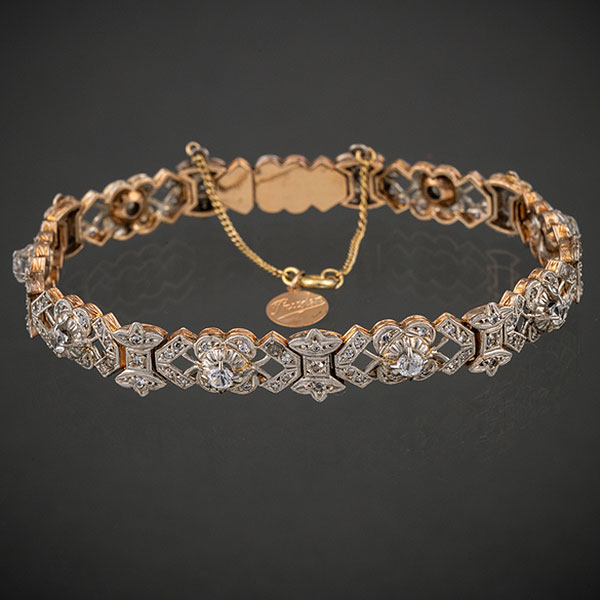 Pulsera antigua en oro amarillo de 18 kt con brillantes.