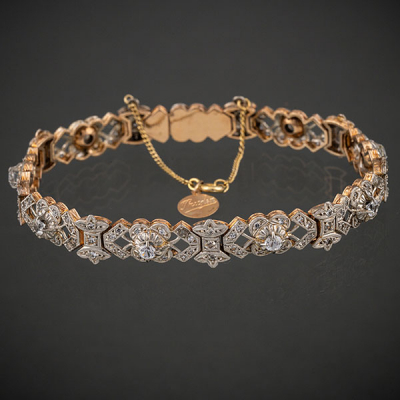 Pulsera antigua en oro amarillo de 18 kt con brillantes.