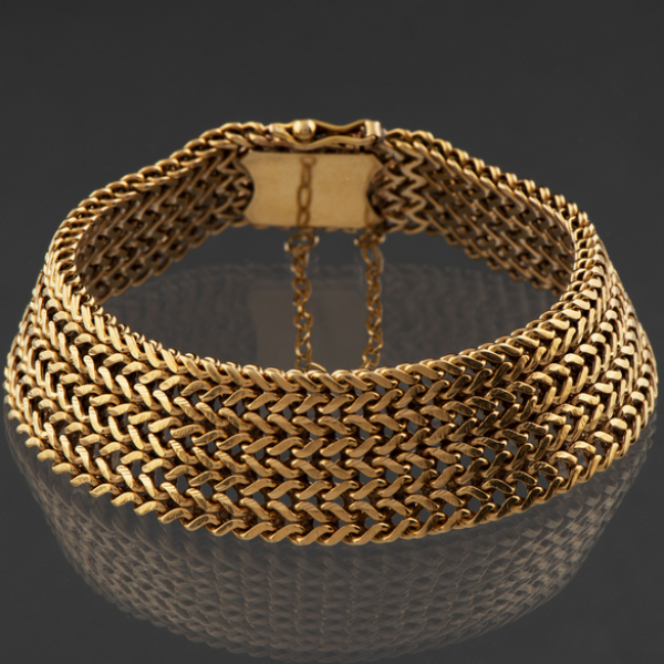 Bonita pulsera de malla ancha en oro amarillo de 18 kt. 