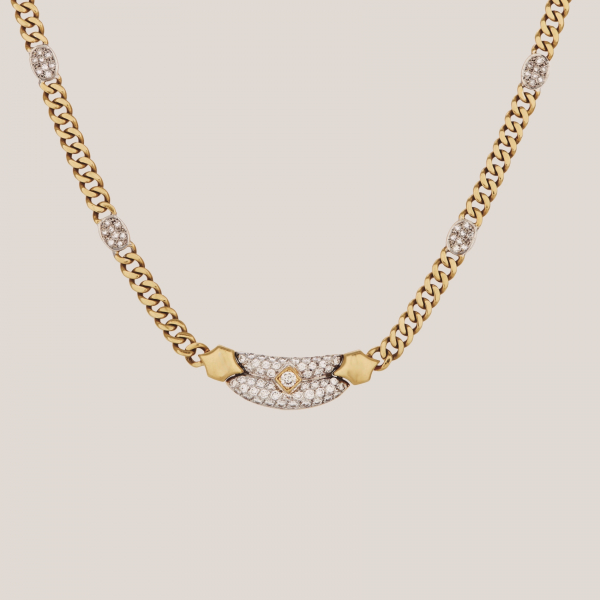 Gargantilla de cadena barbada en oro bicolor con centro y &oacute;valos de diamantes tallas brillante 
