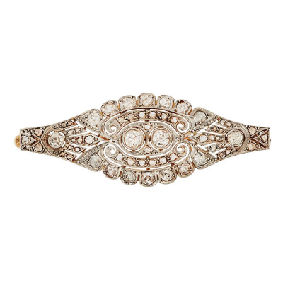 Broche Art Deco en oro y vistas en platino con calado de diamantes tallas brillante antigua y rosa, c.1930