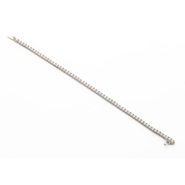 Pulsera riviere en oro blanco con 60 diamantes talla brillante con un peso total de 3,05 cts. aprox.