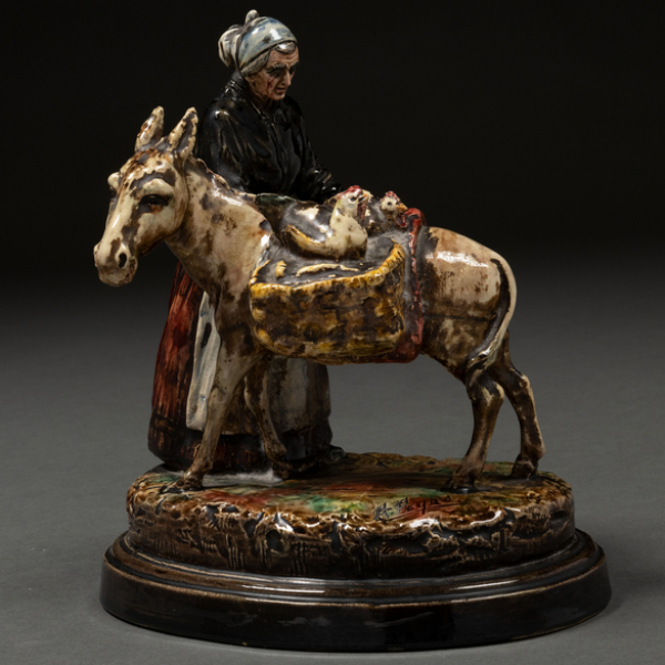 "Valenciana con burro" Figura en cerámica esmaltada.   ANTONIO PEYRO MEZQUITA(Castellón, 1882 -1954)