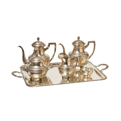 Juego de café de seis piezas en plata española punzonada con decoración perimetral de cordón, motivos vegetales y pies en garras, s.XX.