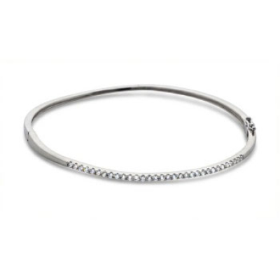 Pulsera rigida en oro blanco y diamantes talla brillante con un peso total 0,40 cts. aprox.