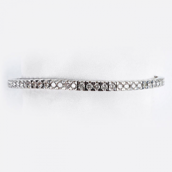 Brazalete riviere en s&oacute;lida montura de oro blanco 18 K, con diamantes 
