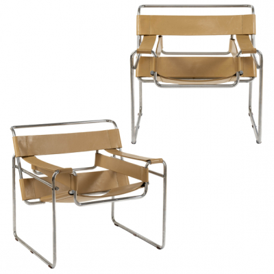 Pareja de sillones "Wassily" en acero tubular cromado y cuero color marr&oacute;n.  MARCEL BREUER (Hungr&iacute;a, 1902- Estados Unidos, 1981)