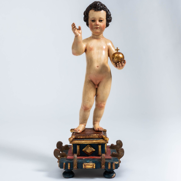 "Niño Jesús salvador del mundo" Escultura en madera tallada y policromada del siglo XVII. 