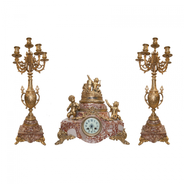 Reloj de sobremesa francés con guarnición de candelabros de seis luces en bronce dorado y mármol, fles. del s.XIX.