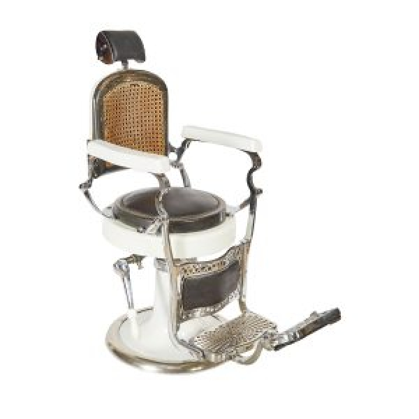 Sill&oacute;n de barbero del fabricante Daniel Acha, Eibar, para industrias Jaso, Guip&uacute;zcoa, en metal cromado y lacado con tapicer&iacute;a en cuero negro y respaldo en rat&aacute;n natural, ppios. del s.XX.