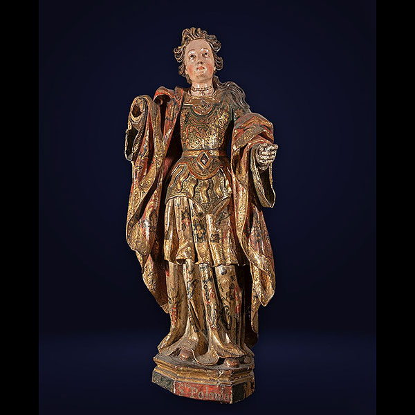 Escuela Sevillana del siglo XVI - Santa Inés.   Madera policromada y dorada.