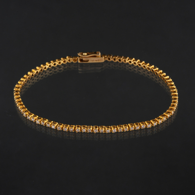 Pulsera Riviere en oro amarillo de 18 kt con brillantes