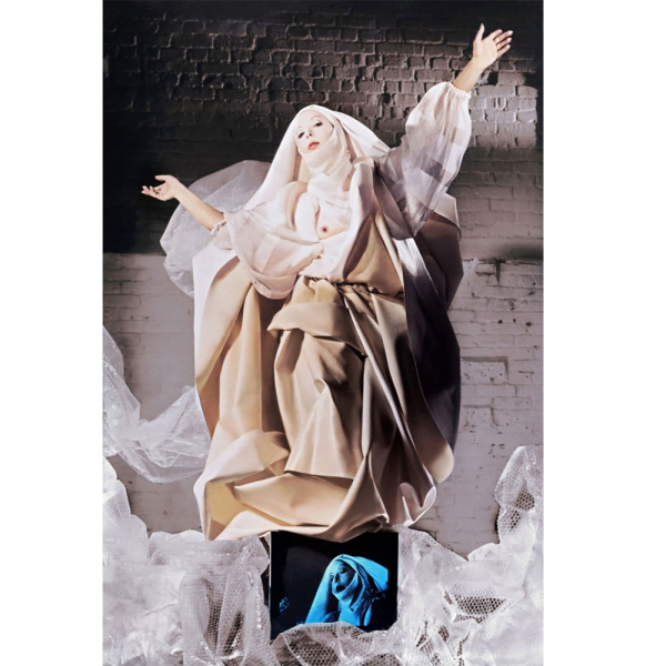 ORLAN. Assumption of White Virgin on Video Monitor and Plastic Wrap Clouds (1983).   