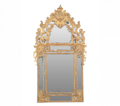 Espejo regencia de madera tallada, estucada y dorada. Trabajo francés, pp. del S. XVIII.