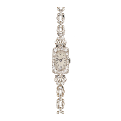 Reloj Art Deco «Dox»de pulsera para señora. En platino. Armis y bisel cuajados de diamantes tallas brillante antigua y 8/8 