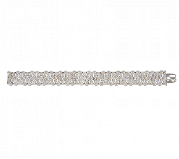 Delicado brazalete de brillantes Art-Decó c.1920 con diseño de líneas geométricas caladas.