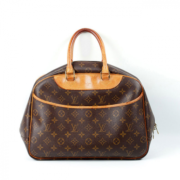 Bolso LOUIS VUITTON modelo Deauville (nº de serie VI 1828), en lona monogram y piel marrón.