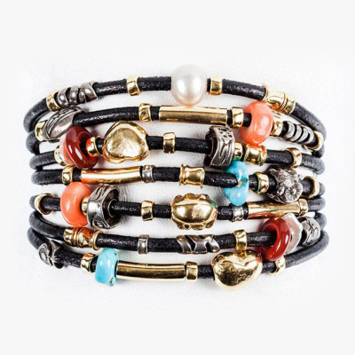 Original pulsera de la firma italiana MISANI MILANO, en oro amarillo 18 K, plata, perlas de agua dulce, coral, cornalina y turquesa.