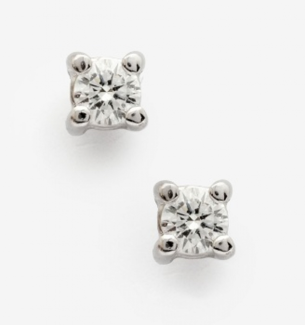 Pendientes solitario en oro blanco y diamantes talla brillante con un peso total de 0,15 cts. aprox.