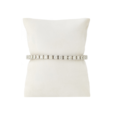 Pulsera rivière en oro blanco con diamantes talla brillante engastados en garras 